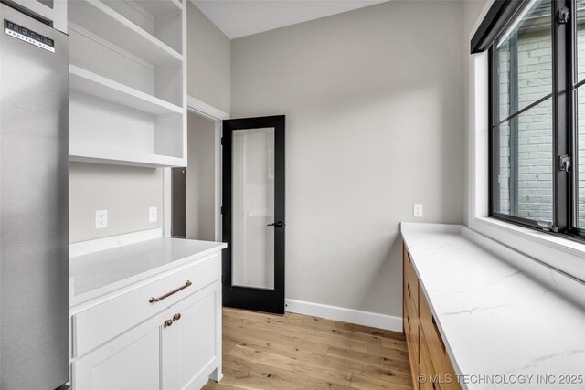 6364 N Blue Sage Dr, Owasso, OK 74055 - interior space featuring light wood-type flooring