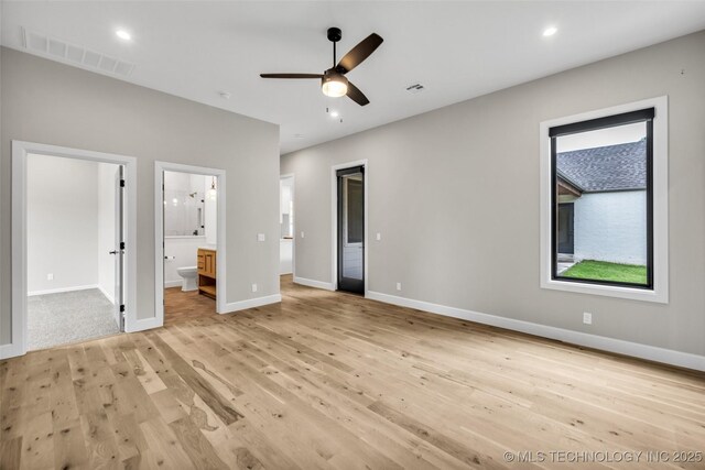 6364 N Blue Sage Dr, Owasso, OK 74055 - unfurnished bedroom featuring light wood-style floors, connected bathroom, recessed lighting, and a ceiling fan