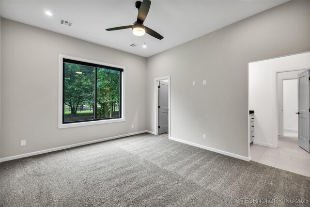 6364 N Blue Sage Dr, Owasso, OK 74055 - spare room featuring carpet and ceiling fan