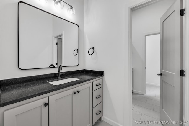 6364 N Blue Sage Dr, Owasso, OK 74055 - bathroom featuring vanity and baseboards