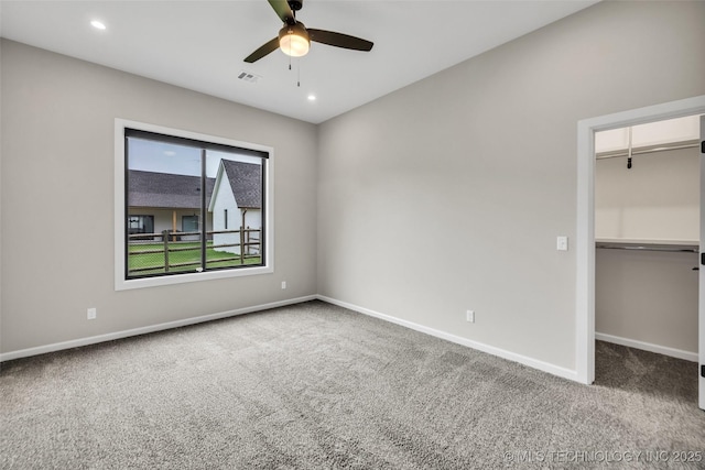 6364 N Blue Sage Dr, Owasso, OK 74055 - unfurnished bedroom with carpet floors, a walk in closet, a closet, ceiling fan, and recessed lighting