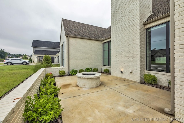 6364 N Blue Sage Dr, Owasso, OK 74055 - view of patio / terrace with an outdoor fire pit