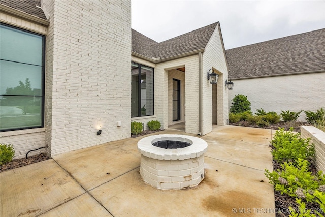 6364 N Blue Sage Dr, Owasso, OK 74055 - view of patio with a fire pit