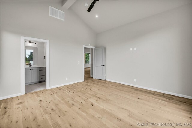 6364 N Blue Sage Dr, Owasso, OK 74055 - unfurnished bedroom with high vaulted ceiling, light wood-type flooring, beamed ceiling, connected bathroom, and ceiling fan