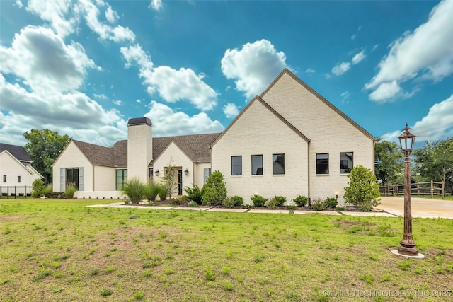 6364 N Blue Sage Dr, Owasso, OK 74055 - view of front facade featuring a chimney and brick siding