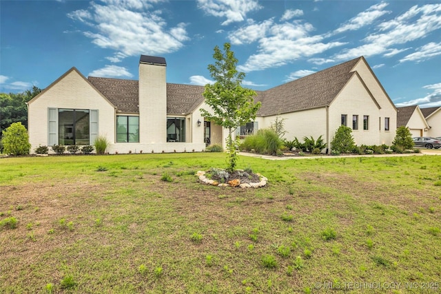6364 N Blue Sage Dr, Owasso, OK 74055 - view of front of property featuring a chimney and a front lawn