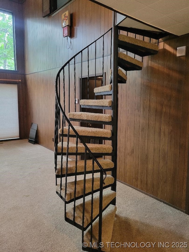 1296 Robin Hood Rd, Eufaula, OK 74432 - staircase with carpet flooring and wood walls