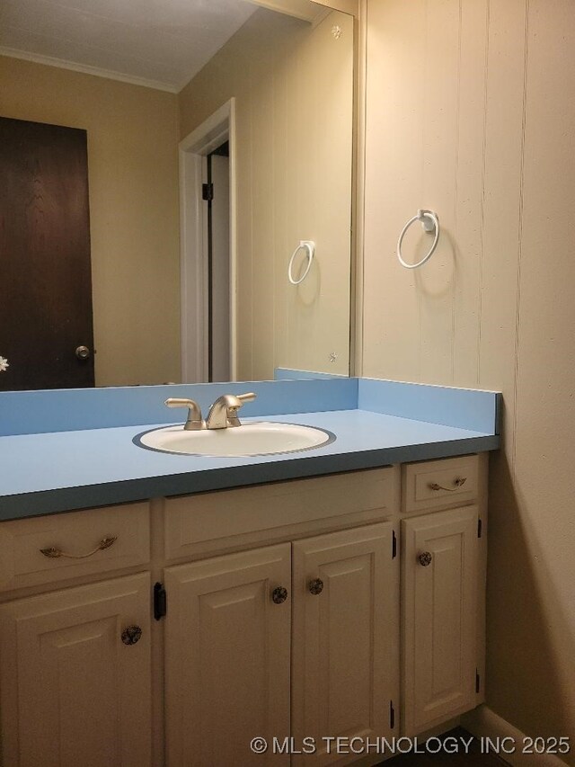 1296 Robin Hood Rd, Eufaula, OK 74432 - bathroom featuring vanity and ornamental molding