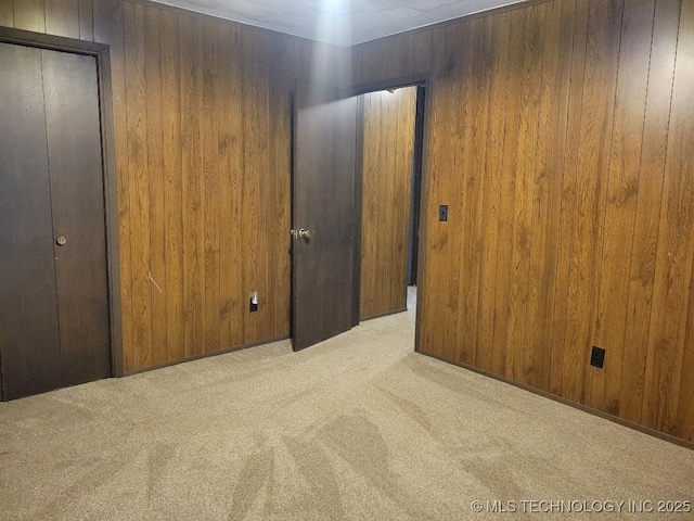 1296 Robin Hood Rd, Eufaula, OK 74432 - unfurnished bedroom with carpet floors and wood walls
