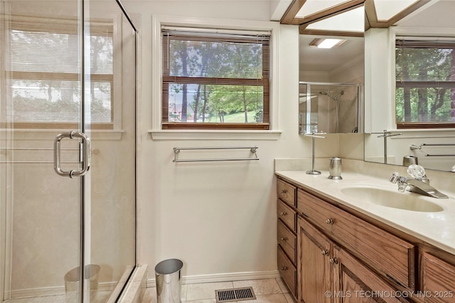 8609 S Joplin Ave, Tulsa, OK 74137 - full bath featuring vanity, a shower stall, tile patterned flooring, and crown molding