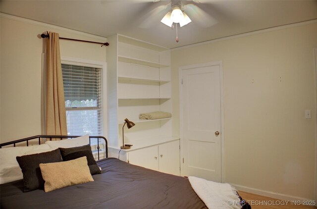 2328 S Delaware Ct, Tulsa, OK 74114 - bedroom with crown molding and a ceiling fan