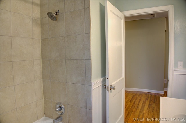 2328 S Delaware Ct, Tulsa, OK 74114 - full bathroom featuring wood finished floors and tub / shower combination