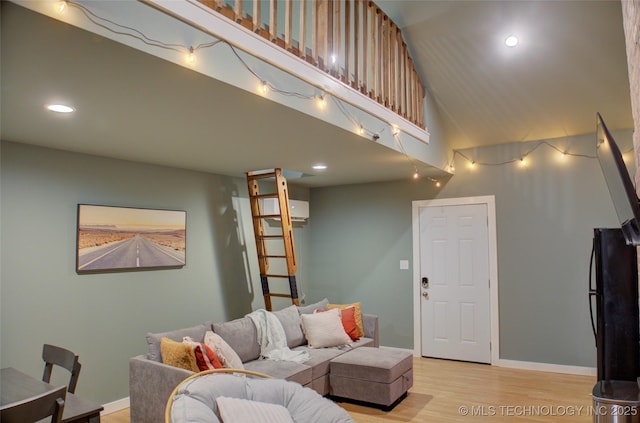 2328 S Delaware Ct, Tulsa, OK 74114 - living area with light wood-style floors, a towering ceiling, and recessed lighting