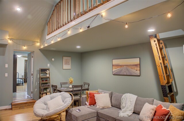 2328 S Delaware Ct, Tulsa, OK 74114 - living room featuring wood finished floors, a high ceiling, and recessed lighting