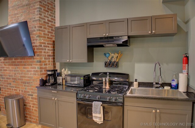 2328 S Delaware Ct, Tulsa, OK 74114 - kitchen with black appliances, under cabinet range hood, and dark countertops