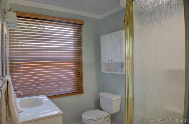 2328 S Delaware Ct, Tulsa, OK 74114 - full bath featuring vanity, crown molding, and a shower with door