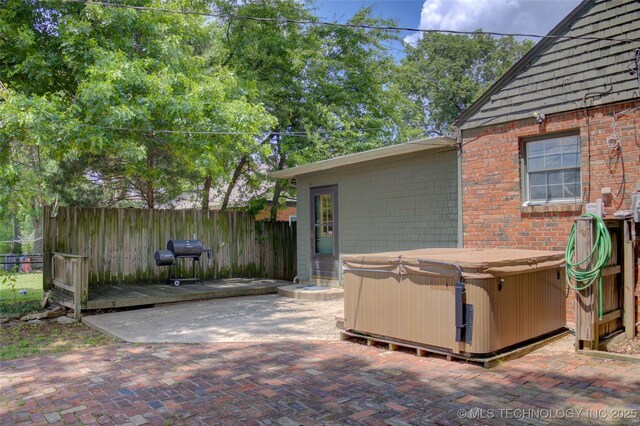 2328 S Delaware Ct, Tulsa, OK 74114 - view of patio featuring a hot tub and area for grilling
