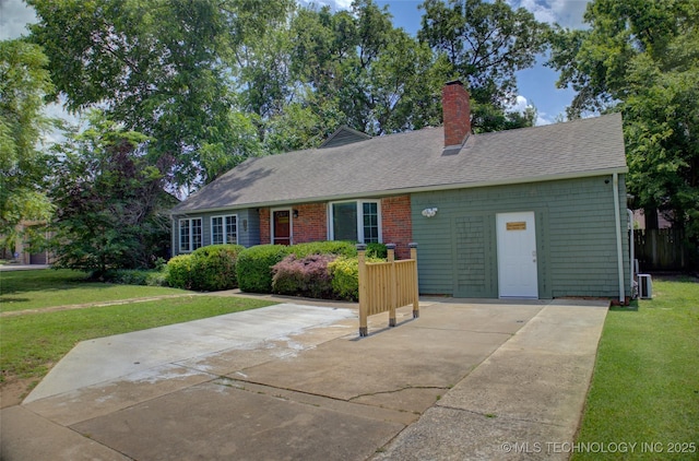 2328 S Delaware Ct, Tulsa, OK 74114 - view of front facade with a front lawn, a chimney, and roof with shingles