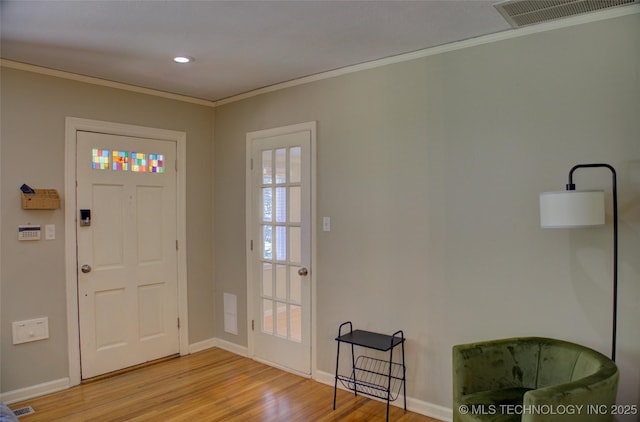 2328 S Delaware Ct, Tulsa, OK 74114 - foyer with light wood-style floors, ornamental molding, and recessed lighting