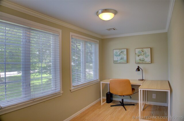 2328 S Delaware Ct, Tulsa, OK 74114 - office with wood finished floors, plenty of natural light, and crown molding