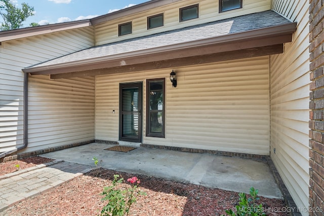 7927 S 86th E Ave, Tulsa, OK 74133 - view of exterior entry with a shingled roof