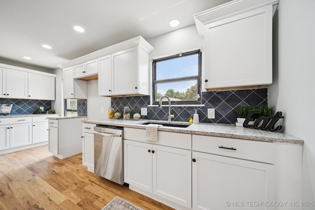 7927 S 86th E Ave, Tulsa, OK 74133 - kitchen featuring stainless steel dishwasher, recessed lighting, light wood-style floors, white cabinetry, and tasteful backsplash
