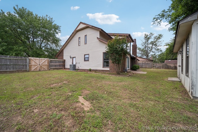7927 S 86th E Ave, Tulsa, OK 74133 - back of house featuring a fenced backyard and a gate