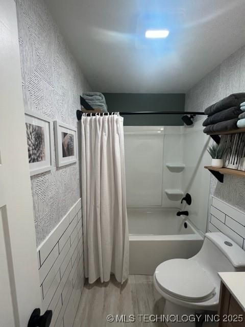 251 Greer Rd, Longtown, OK 74432 - bathroom featuring vanity, shower / tub combo, and wood finished floors