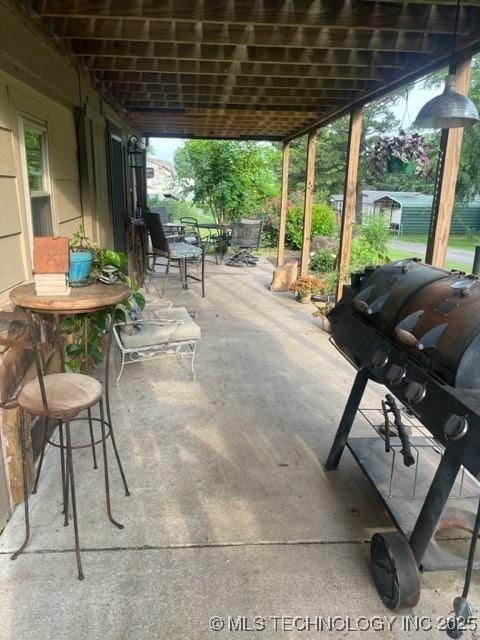 251 Greer Rd, Longtown, OK 74432 - view of patio / terrace featuring outdoor dining space