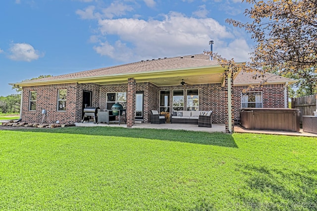 330 Loma Vista Ln, Skiatook, OK 74070 - rear view of property featuring a patio, a ceiling fan, brick siding, an outdoor living space, and a hot tub