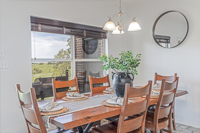 330 Loma Vista Ln, Skiatook, OK 74070 - dining area featuring a chandelier and crown molding