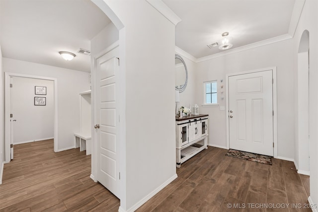 1813 E Van Buren Pl, Broken Arrow, OK 74011 - foyer with arched walkways, wood finished floors, and crown molding