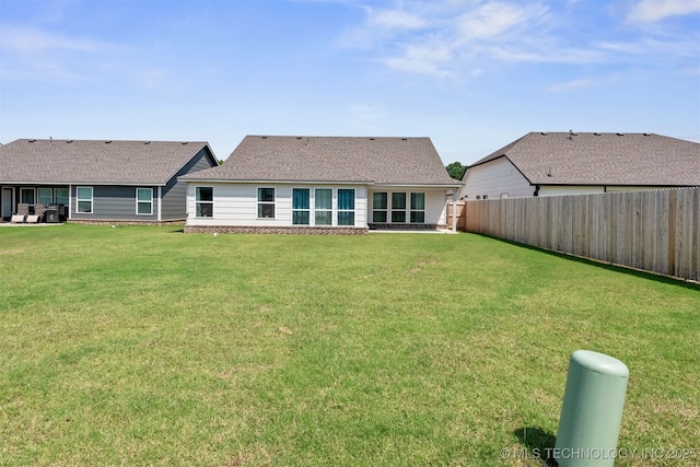 1813 E Van Buren Pl, Broken Arrow, OK 74011 - rear view of house featuring a fenced backyard and a shingled roof