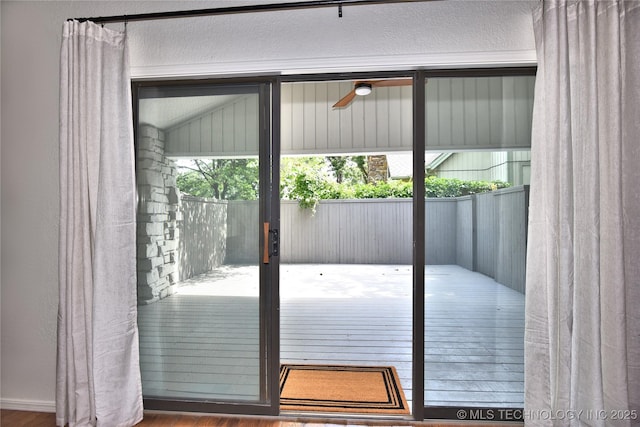 8504 S Winston Ave, Tulsa, OK 74137 - doorway featuring wood finished floors and healthy amount of natural light