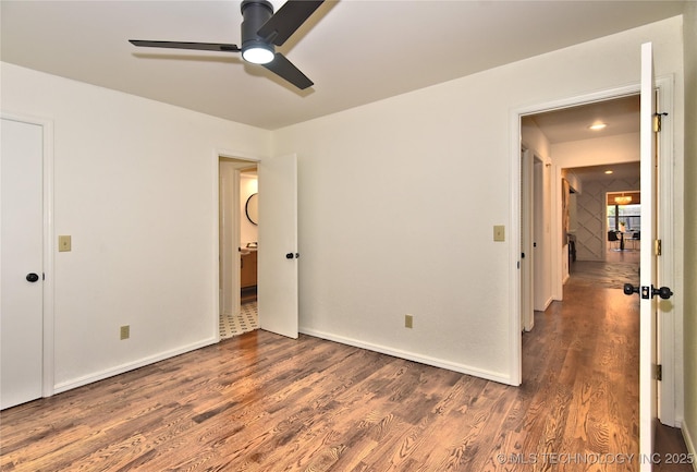 8504 S Winston Ave, Tulsa, OK 74137 - unfurnished bedroom with wood finished floors and ceiling fan