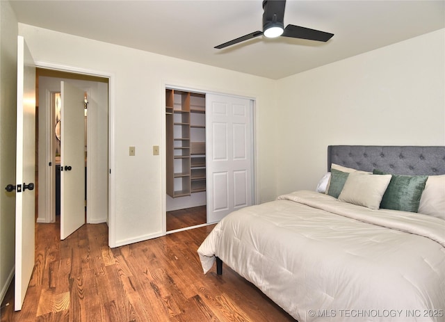 8504 S Winston Ave, Tulsa, OK 74137 - bedroom with a closet, wood finished floors, and ceiling fan