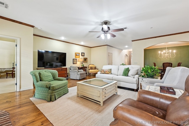 4733 S 167th E Pl, Tulsa, OK 74134 - living area with crown molding, wood finished floors, a chandelier, ceiling fan, and recessed lighting