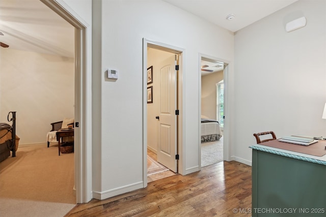 4733 S 167th E Pl, Tulsa, OK 74134 - hall featuring a desk and wood finished floors