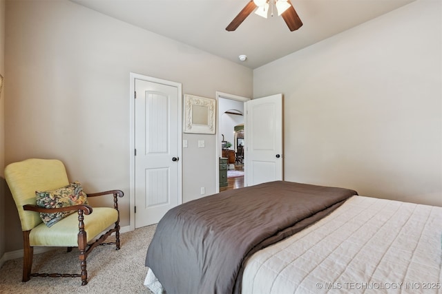 4733 S 167th E Pl, Tulsa, OK 74134 - carpeted bedroom with baseboards and a ceiling fan