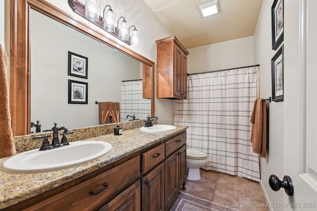 4733 S 167th E Pl, Tulsa, OK 74134 - bathroom with double vanity and a shower with shower curtain
