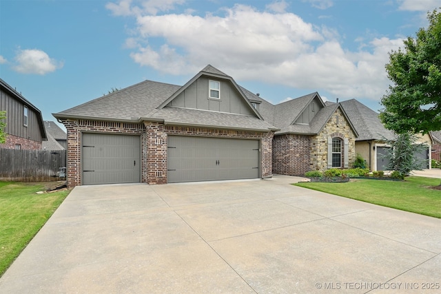 4733 S 167th E Pl, Tulsa, OK 74134 - view of front of house featuring concrete driveway, a shingled roof, an attached garage, and board and batten siding
