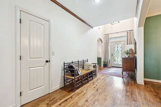 4733 S 167th E Pl, Tulsa, OK 74134 - foyer entrance with arched walkways, wood finished floors, and crown molding