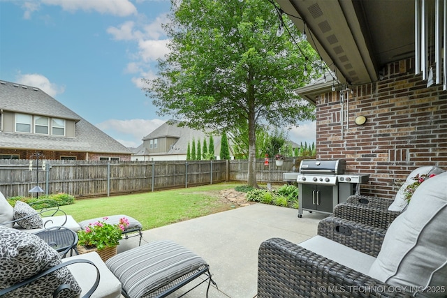 4733 S 167th E Pl, Tulsa, OK 74134 - fenced backyard with a patio area and area for grilling