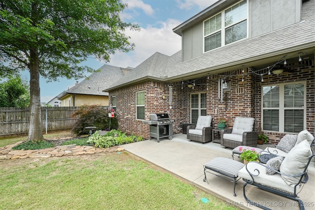 4733 S 167th E Pl, Tulsa, OK 74134 - back of house with a patio, brick siding, and stucco siding