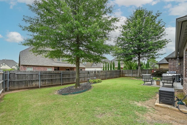 4733 S 167th E Pl, Tulsa, OK 74134 - fenced backyard featuring a patio