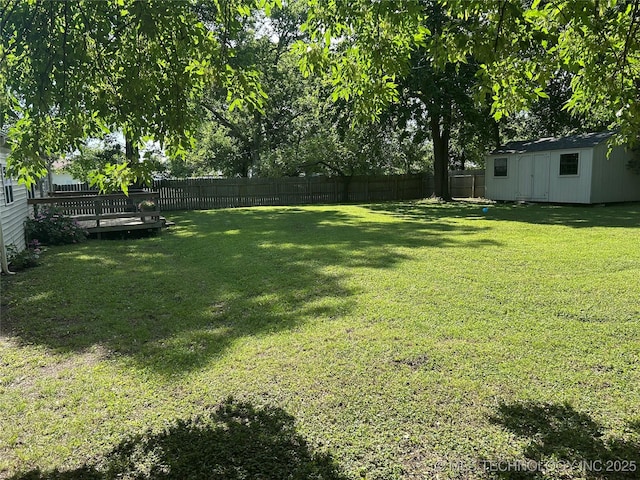 119 E Quesenbury, Sallisaw, OK 74955 - fenced backyard featuring a shed
