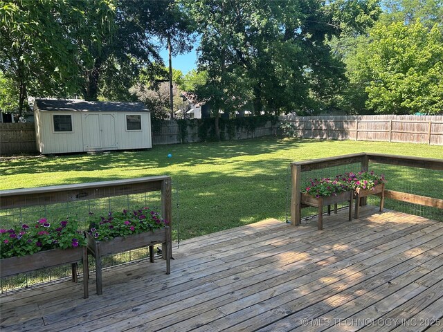119 E Quesenbury, Sallisaw, OK 74955 - wooden terrace featuring a fenced backyard and a storage shed