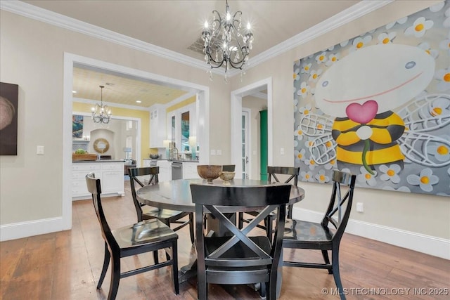 20565 E Clear Brook Rd, Owasso, OK 74055 - dining space featuring a chandelier, light wood-style flooring, and ornamental molding