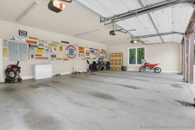 20565 E Clear Brook Rd, Owasso, OK 74055 - garage with a garage door opener and electric panel