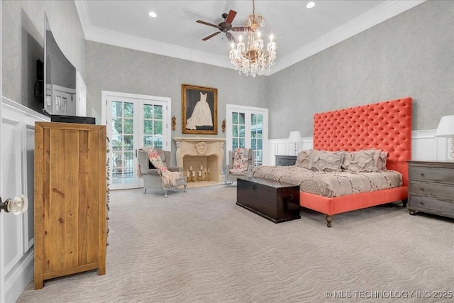 20565 E Clear Brook Rd, Owasso, OK 74055 - bedroom with carpet flooring, crown molding, access to exterior, a fireplace, and a chandelier